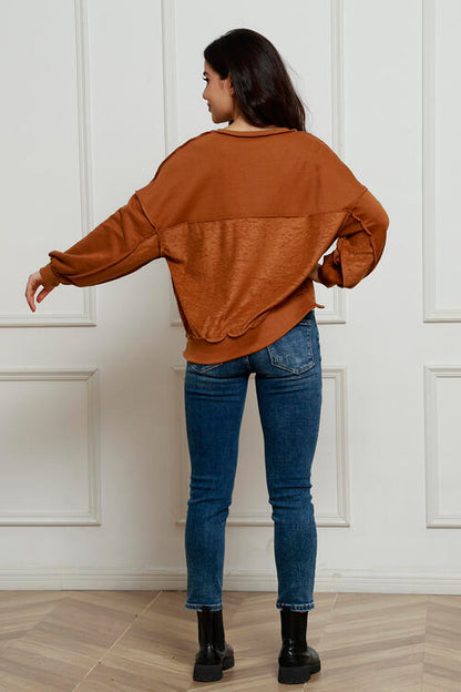 Exposed Seam Half Button Long Sleeve Sweatshirt